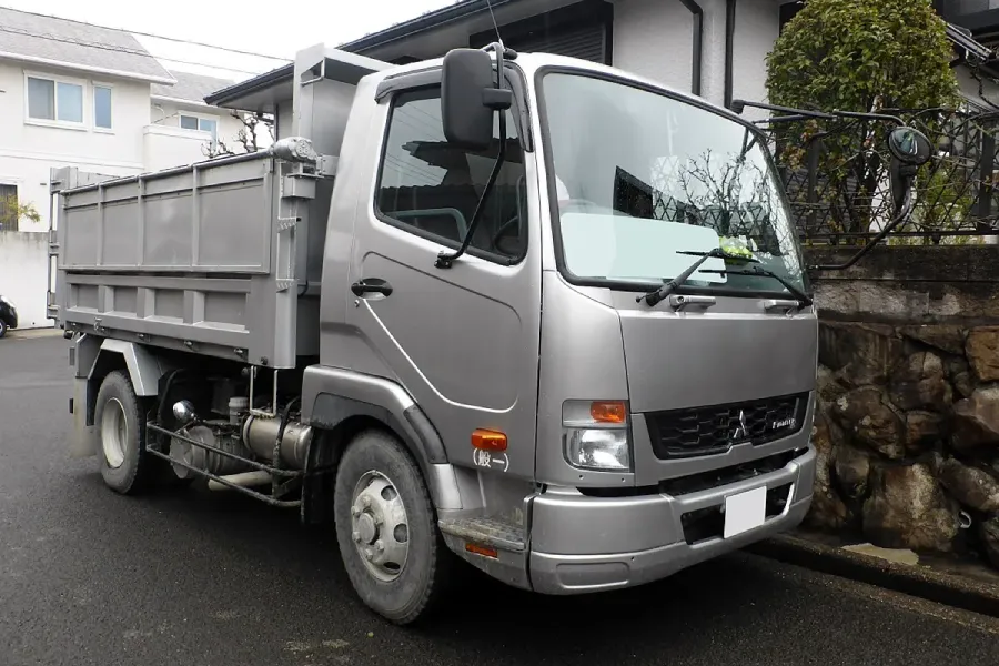 pasang ac mitsubishi fuso fighter di Sorong